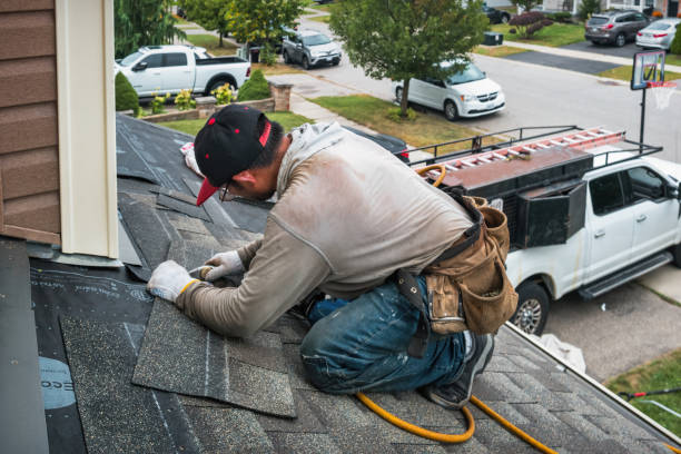 Professional Flat Roof Repair technician working in West Hyannisport, MA